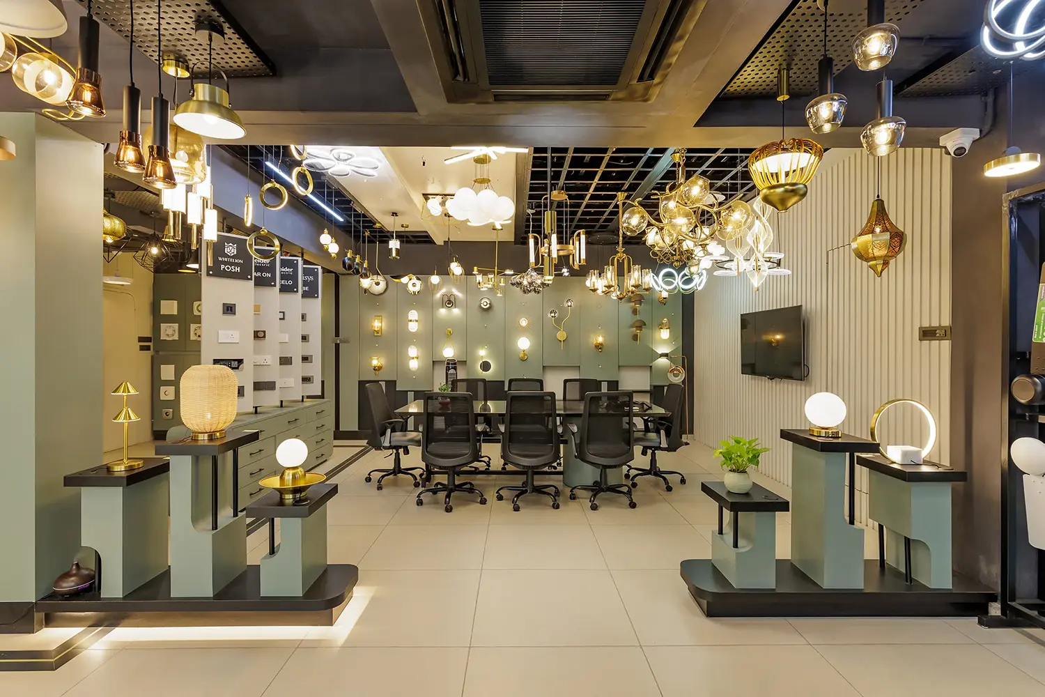 V-Light first floor — decorative hanging lights, chandeliers and table lamps on display
